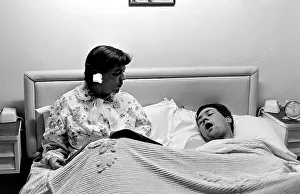 Snoring: Woman with snoring husband