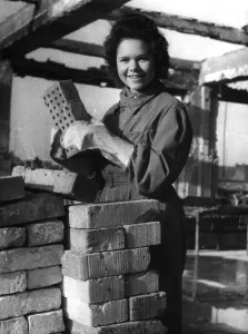 Remedy: Woman sorting bricks, 1944