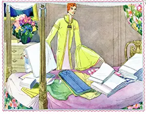 Sorting: Woman sorting out laundry on four poster bed