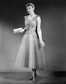 Pocketbook: Woman Standing Inside Wearing