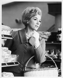 Apprehensively: WOMAN IN A SUPERMARKET
