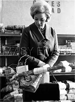 Baguette: WOMAN IN A SUPERMARKET