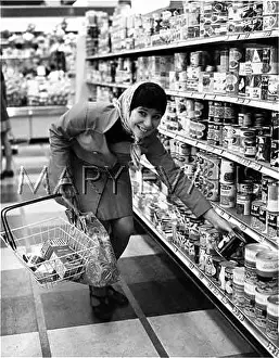Artichoke: WOMAN IN A SUPERMARKET
