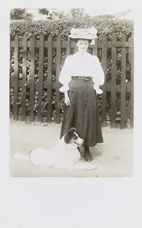 Walkies: Woman taking a dog for a walk