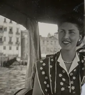 Gondola: Woman taking a ride on a gondola