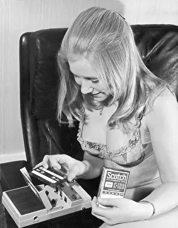 Cassette: WOMAN/TAPE PLAYER