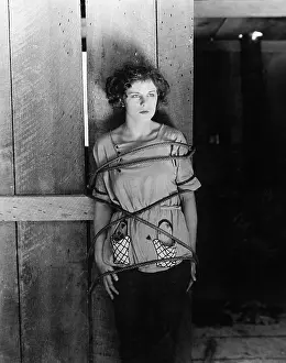 Bondage: Woman tied up with rope