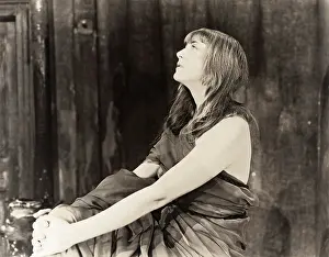 Daydreaming: Woman in toga lost in thought