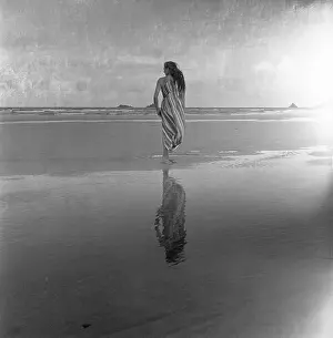 A Flying History - Peter Keating Aviation Collection: Woman on a twilight beach