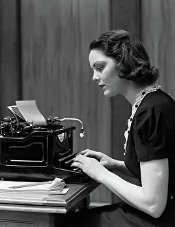 Paneling: Woman typing on underwood typewriter