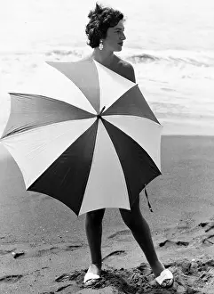 Woman with umbrella on the