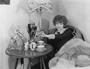 Teacup: Woman with urn and teacups