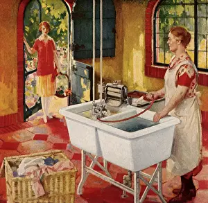 Cleans: A Woman uses a Four Way Laundry Tray