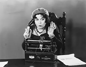 Startling: Woman using Dictaphone