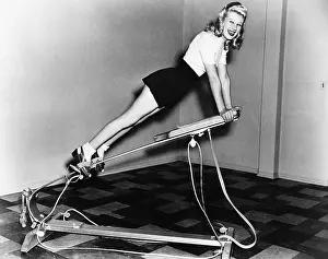 Strengthen: Woman using exercise equipment
