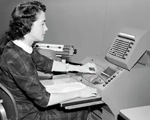 Retrieval: Woman Using An Ibm Cardotype Accounting Machine