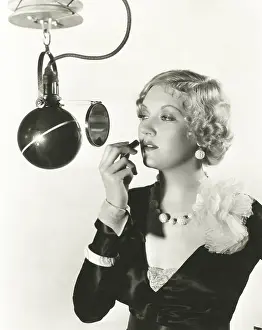 Gorgeous: Woman using microphone mirror