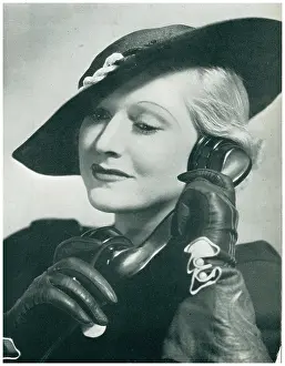 Tilted: Woman Using Telephone