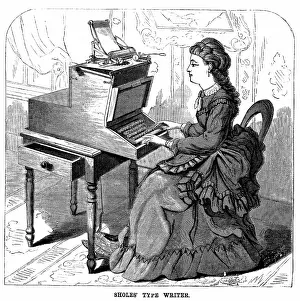 Typewriter: Woman using typewriter by American inventor Christopher