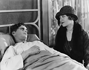 Tenderness: Woman visiting sick man