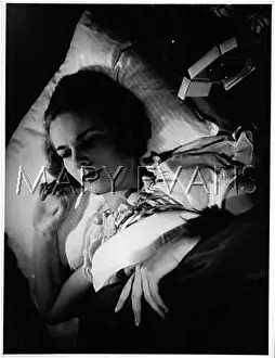 Woken: WOMAN WAKING UP 1940S