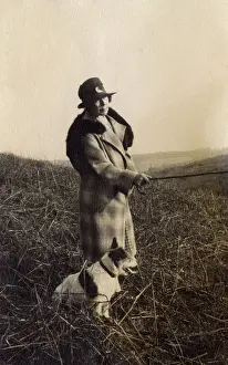 Walkies: Woman out walking with terrier dog
