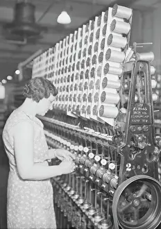 Reel: Woman warpfilling thread on a loom, 1936