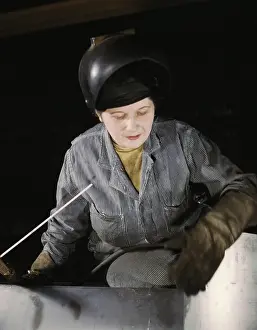 Welding: Woman welder, front view, 1943