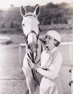 Obedient: Woman with white horse