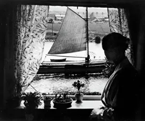 Claims: Woman at a window, 1932