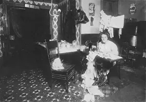 Pinafores: Woman working in basement, from caption: ?