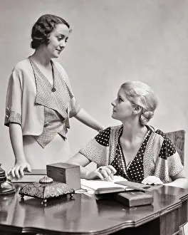 Businesswomen: Woman Working at Desk Table Talking to Her Supervisor