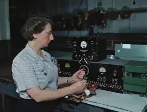 Measurement: Woman working with the electric wiring at