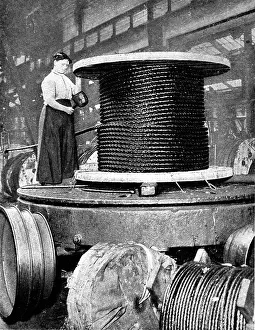 Coiling: Woman working in a rope works 1916