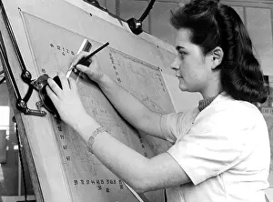 Fixture: Woman working at a technical drawing board