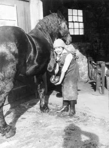 Blacksmith: Woman works as blacksmith, 1927