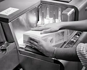 Punched: Woman?s Hands Loading Data Punched Cards into