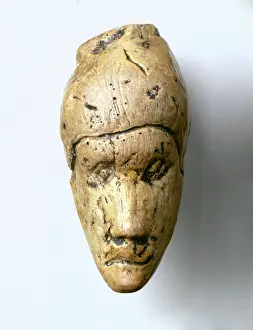 Dolni: Woman's head carved in mammoth ivory