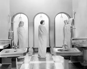 Bathrooms: Three women in a bathroom together