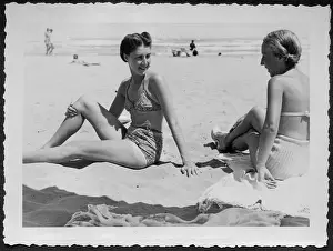 Swimsuits: Two women on a beach in Italy