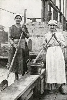 Cement: Two women doing building work, Vienna, Austria