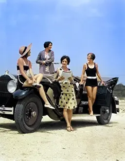 Grownups: Four Women in Dresses and Bathing Suits Gathered