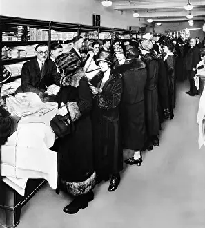 Hems: Women eagerly shop across the counter at ?