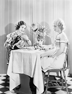 Blonds: Two women having tea together