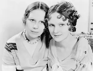 Naive: Two women holding each other close
