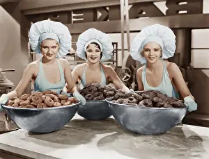 Doughnut: Three women with huge bowls of donuts