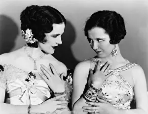 Coquette: Two women imitating each other