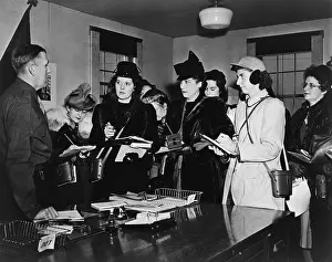 Opportunities: Women journalists taking notes in meeting with
