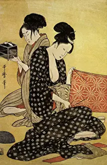 Utamaro: Women Making Dresses