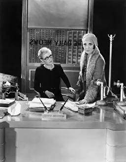 Employ: Two women in an office
